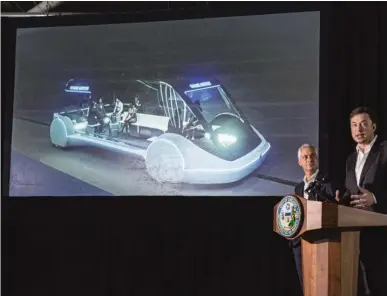  ??  ?? Mayor Rahm Emanuel and Elon Musk discuss plans Thursday for a high- speed rail service between O’Hare and downtown.