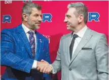  ?? RYAN REMIORZ LA PRESSE CANADIENNE ?? Le directeur général du Tricolore, Marc Bergevin, a nommé Joël Bouchard à titre d’entraîneur-chef de son club-école de Laval.