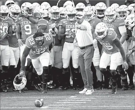  ?? ERIC GAY/AP ?? One game into his third season as coach of Texas, Tom Herman is 18-10. He led the Longhorns to bowl victories in each of the last two seasons.