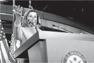  ?? SUSAN WALSH/AP ?? House Speaker Nancy Pelosi holds a news conference Thursday at the Capitol, which was ransacked Jan. 6.