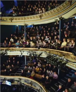  ?? DAVID AZIA, NEW YORK TIMES ?? A crowd takes in “Sunny Afternoon,” a new show about The Kinks, at the Harold Pinter Theatre in London.