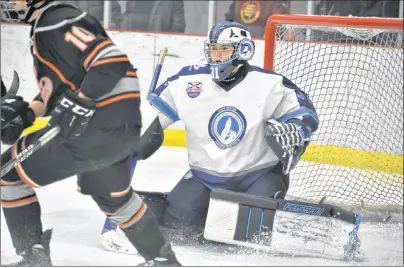  ?? T.J. COLELLO/CAPE BRETON POST ?? Seth Crowe made 35 saves to backstop the Cape Breton Unionized Tradesmen to a 4-2 win over the Cape Breton West Islanders in Nova Scotia Eastlink Major Midget Hockey League playoff action Tuesday at the Membertou Sport and Wellness Centre.