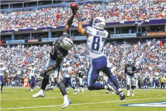  ?? Wesley Hitt / Getty Images ?? Safety Karl Joseph deflects a pass intended for Tennessee’s Eric Decker in the first half.