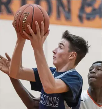  ?? Steph Chambers/Post-Gazette ?? Aquinas Academy’s Vinnie Cugini is looking like the best freshman scorer in WPIAL basketball history. Cugini is averaging 33.9 points a game.