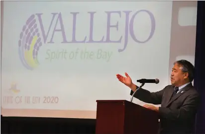  ?? CHRIS RILEY — TIMES-HERALD ?? Vallejo mayor Bob Sampayan helps unveil the new city logo during the 2020State of the City Address at the Dan Foley Cultural Center in Vallejo on Wednesday.
