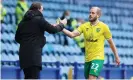  ??  ?? The Norwich goalscorer Teemu Pukki shakes the hand of Daniel Farke at Hillsborou­gh. Photograph: Alex Livesey/Getty Images