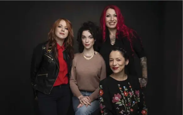  ?? TAYLOR JEWELL/INVISION/THE ASSOCIATED PRESS ?? From left Roxanne Benjamin, Annie Clark, Jovanka Vuckovic and Sofia Carrillo, bottom right, all worked on XX, the first all-female horror anthology.