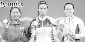  ??  ?? Ending the country’s 20- year drought at the Olympics, Diaz won the silver in the 2016 Rio Olympics and stood proudly with gold medalist Hsu Shu- ching of Chinese Taipei (center) and bronze medalist Yoon Jin- hee of South Korea (right).