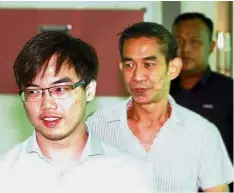  ??  ?? Harrowing experience: Chan (left) arriving at the Shah Alam Sessions Court with another witness.