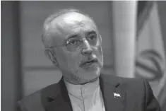  ?? Associated Press ?? ■ Iran's nuclear chief Ali Akbar Salehi speaks in an interview with The Associated Press on Sept. 11, 2018, at the headquarte­rs of Iran's atomic energy agency, in Tehran, Iran.