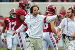  ?? AP-Vasha Hunt ?? Alabama head coach Nick Saban yells to his team during the first half of an NCAA college football game against Western Carolina, Saturday in Tuscaloosa, Ala.