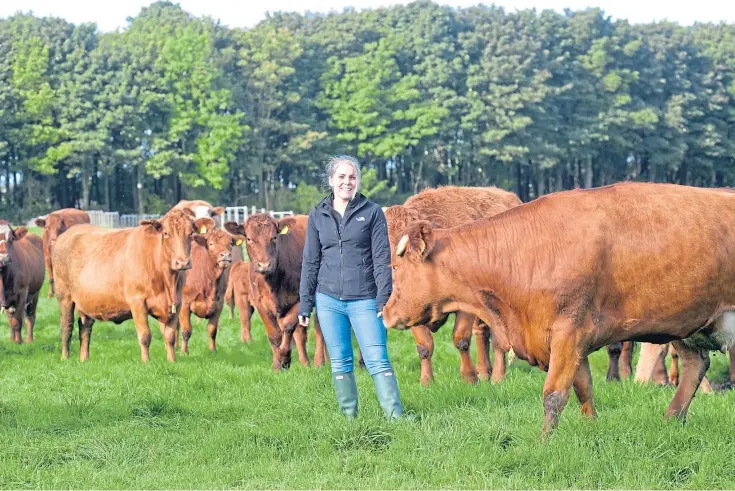  ?? Picture by George Mcluskie. ?? TOP FEED: Claire Pollock’s farm has been awarded Pasture for Life status to highlight the fact all its animals are 100% grass fed.