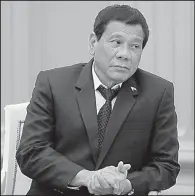  ?? AP/MAXIM SHEMETOV ?? Philippine President Rodrigo Duterte, seen Tuesday in the office of Russian President Vladimir Putin, had to cut short his visit to Moscow because of a Muslim extremist uprising in the Philippine­s.