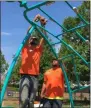  ?? RICHARD PAYERCHIN — THE MORNING JOURNAL ?? One of the 88 volunteers works on the playground at Lorain’s Falbo Park on Aug. 3.