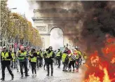  ??  ?? Unrest: The introducti­on of carbon taxes sparked riots in France