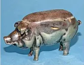  ?? ?? > Edwardian silver pig pin cushion