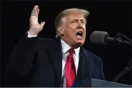  ?? EVAN VUCCI — THE ASSOCIATED PRESS FILE ?? President Donald Trump speaks at a campaign rally in Valdosta, Ga., for Senate Republican candidates.