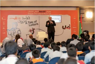  ?? Supplied photo ?? James W. Parkinson speaks to students at the Sharjah Internatio­nal Book Fair. —