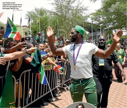  ?? GETTY IMAGES ?? Siya Kolisi greets supporters in South Africa after the Springboks won the Rugby World Cup.