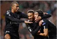  ?? — AFP ?? PSG’s Neymar (centre) celebrates with Kylian Mbappe (left) and Edinson Cavani after scoring against Celtic.