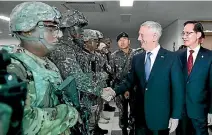  ?? PHOTO: REUTERS ?? US Defence Secretary Jim Mattis and South Korean Defence Minister Song Youngmoo visit the truce village of Panmunjom.