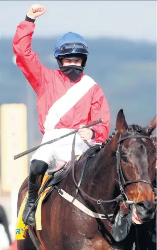  ??  ?? Familiar sight: Rachael Blackmore celebrates after winning the Ryanair Chase on Allaho