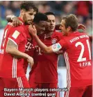  ??  ?? Bayern Munich players celebrate David Alaba’s (centre) goal