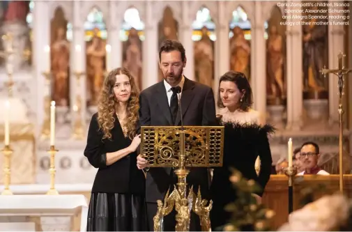  ??  ?? Carla Zampatti’s children, Bianca Spender, Alexander Schuman and Allegra Spender, reading a eulogy at their mother’s funeral.