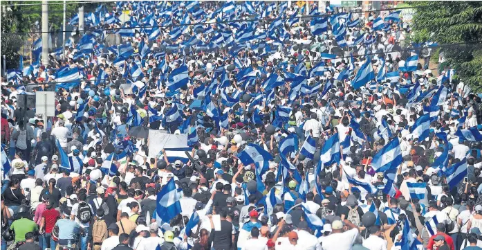  ?? Rodrigo arangua/afp ?? “¡Fuera Ortega!” fue una de las consignas que se escuchó en la marcha de ayer en Managua