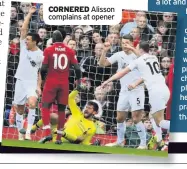  ??  ?? CORNERED Alisson complains at opener