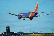  ?? Julio Cortez / Associated Press ?? A Southwest Airlines flight from Bradley lands at Thurgood Marshall Airport in Maryland.