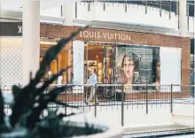  ?? JUSTIN T. GELLERSON THE NEW YORK TIMES FILE PHOTO ?? Louis Vuitton, LVMH’s biggest brand, reported a slowdown in sales from Chinese shoppers during the third quarter.