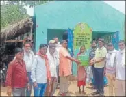  ?? HT PHOTO ?? ■ A Sabar tribe member at Tangrain village in Potka block after getting housing, water tank and other basic facility.