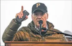  ??  ?? Actor and Pittsburgh native Michael Keaton addresses the crowd Friday at the Rally for Peace and Tree of Life Victims.