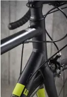  ??  ?? Below Semi-internal cable routing and a smooth riding back end are impressive for £420 Bottom We’d swap the moulded brake pads for cartridge ones