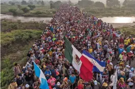  ?? — AFP ?? Aerial view of Honduran migrants heading in a caravan to the US as they leave Arriaga on their way to San Pedro Tapanatepe­c, in southern Mexico on Saturday.