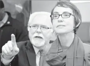  ?? Pool photo by Matt York ?? Only Democrat in race: Gabrielle Giffords tours the Gabrielle Giffords Family Assistance Center with Ron Barber on Jan. 23 in Tucson. Barber is in a special election to serve the rest of her term.