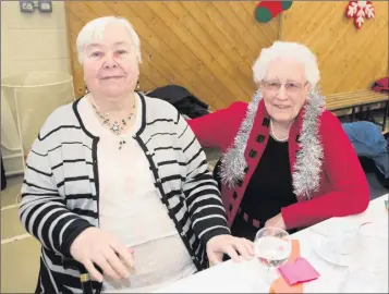  ??  ?? Marie Crowe and Nell Carey at the Bray Senior Citizens Christmas party in St Thomas’s School in Bray.