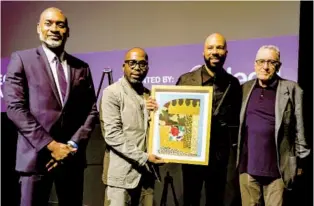  ?? MICHAEL LOCCISANO GETTY IMAGES ?? From left: Charles Blow, Derrick Adams, Common and Robert De Niro onstage after Common received the Harry Belafonte Voices for Social Justice Award at the 2022 Tribeca Film Festival.