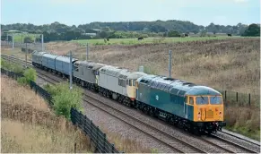  ?? ?? GBRf’s No. 56081 passes Stone Road hauling the 5M56 Leicester LIP to Longport on September 21, consisting of Nos. 56104, 56312, 6394, 6393 and 47749. Brad Joyce