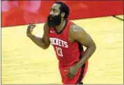  ?? CARMEN MANDATO / POOL VIA AP ?? The Rockets’ James Harden reacts to a basket during Sunday’s game in Houston, Texas.