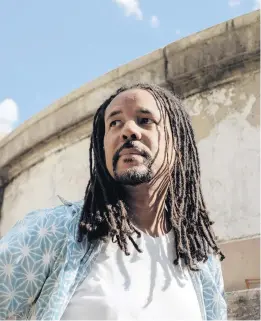  ?? JASMINE CLARKE/THE NEW YORK TIMES ?? After winning back-to-back Pulitzers for “The Undergroun­d Railroad” and “The Nickel Boys,” author Colson Whitehead took another detour with his 10th book and first crime novel,
“Harlem Shuffle.”