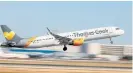  ?? /Reuters ?? Flight mode: Thomas Cook’s airline business was insulated from the tough environmen­t, as the tour operator pledges to fill many of its seats.