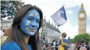  ?? Picture: REUTERS ?? BLUE IN THE FACE: A woman demonstrat­es against Britain’s decision to leave the EU, in London