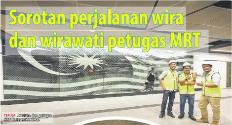  ??  ?? TERUJA: Jurutera dan petugas MRT di stesen Merdeka.