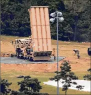  ?? KIM JUN-BEOM / YONHAP ?? A U.S. Terminal High Altitude Area Defense missile defense unit is installed May 2 at a golf course in Seongju, South Korea. The THAAD system has strained South Korea’s relations with its neighbors.