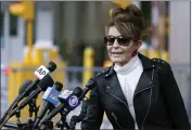  ?? SETH WENIG — THE ASSOCIATED PRESS FILE ?? Former Alaska Gov. Sarah Palin speaks briefly to reporters as she leaves a courthouse in New York.