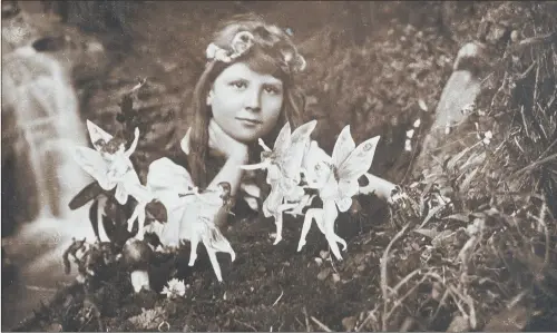  ??  ?? Alice and the Fairies, a sepia gelatin silver print of Frances ‘Alice’ Griffiths taken by Elsie Wright, and one of the infamous Cottingley Fairy photograph­s.