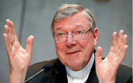  ?? PHOTO: REUTERS ?? A book to be released this week includes abuse allegation­s against Cardinal George Pell.