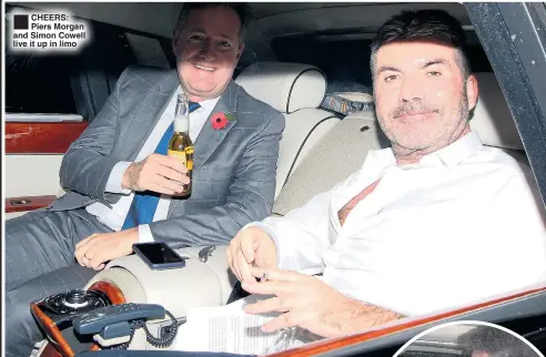  ??  ?? CHEERS: Piers Morgan and Simon Cowell live it up in limo